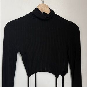 black long-sleeved turtleneck crop top with ties
